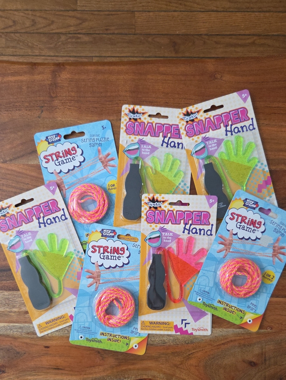 Party Favors - Set Of 7 Featuring Snapper Hand And String Game